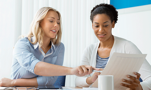 two-colleagues-in-a-staff-performance-manangement-meeting-1.png